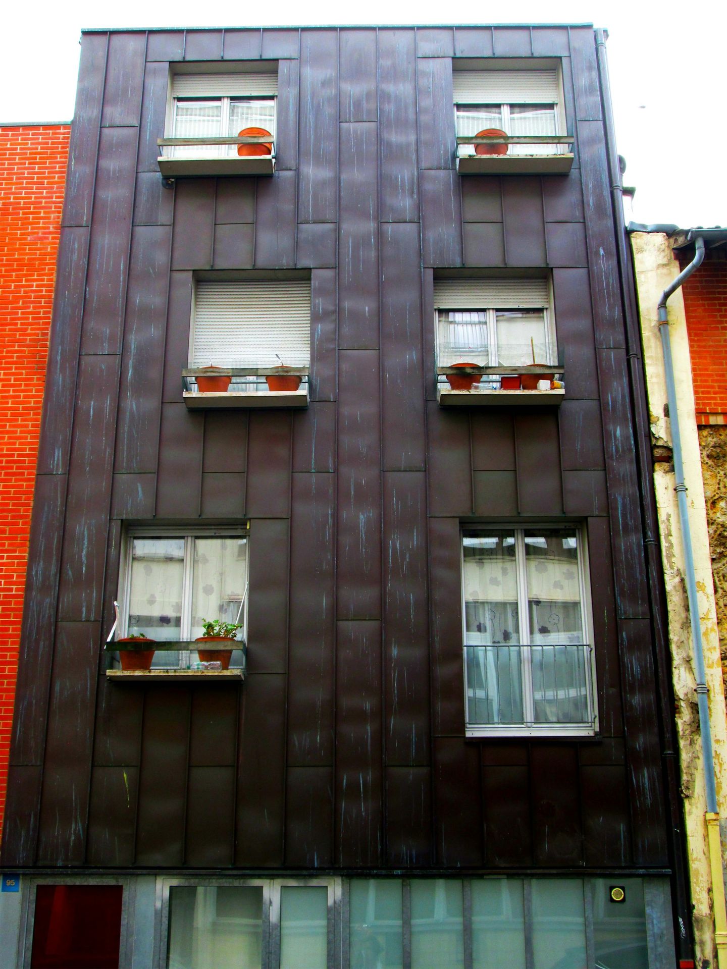 Metallfassade Mehrparteienhaus Baden